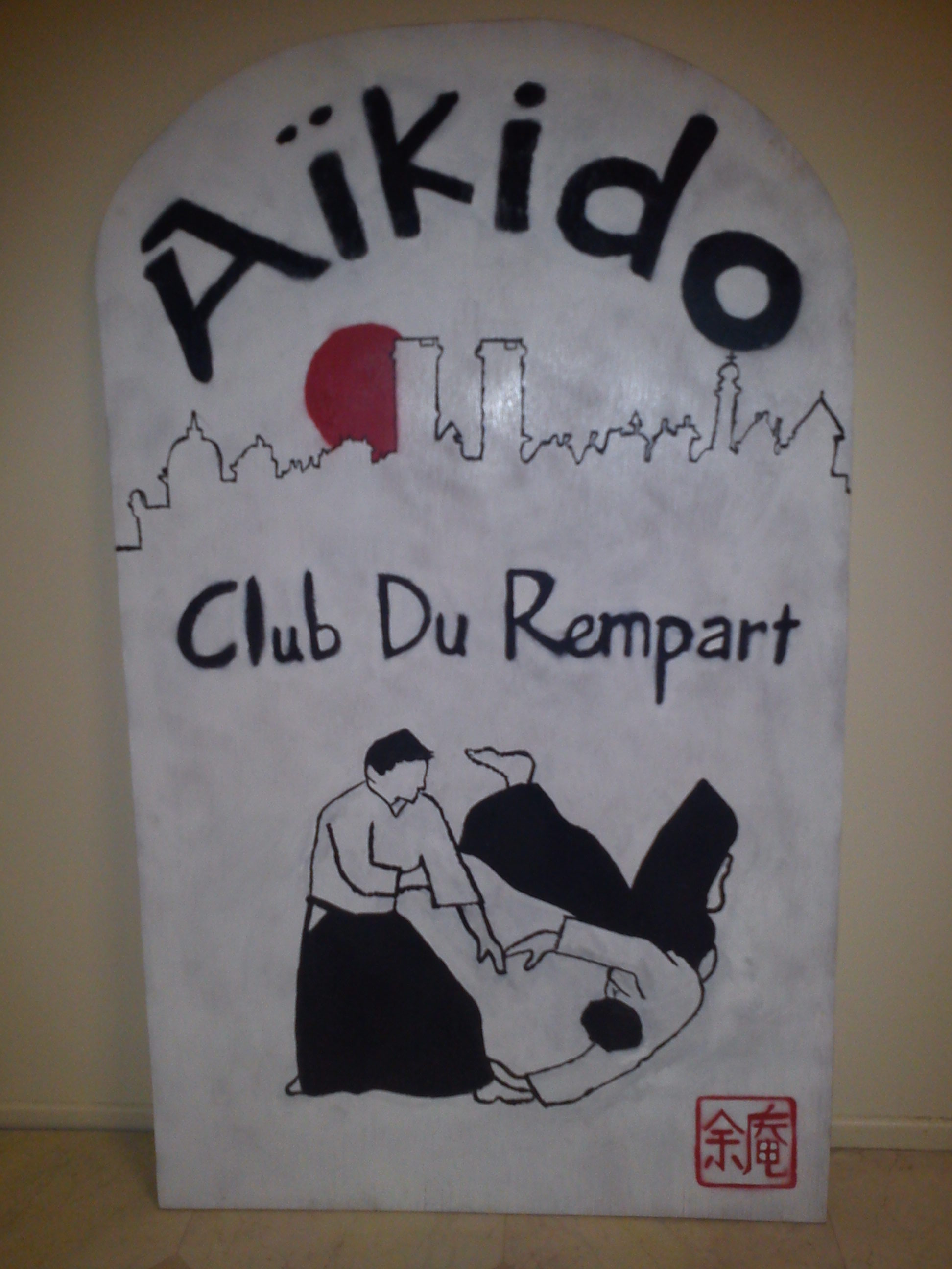 Panneau en bois peint pour faire la promotion de l'Aïkido Club du Rempart de Langres en 2017